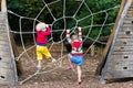 Children climb on school yard playground Royalty Free Stock Photo