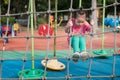 Children are climbing the net on the playground Royalty Free Stock Photo