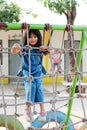 Children are climbing on a rope bridge. Royalty Free Stock Photo