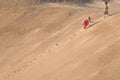 Children Climbing On The Sand dune. Summer day Royalty Free Stock Photo