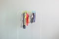 Children clothes on a hanger on a colored background. Children`s clothing, children`s shopping. Royalty Free Stock Photo