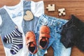 Children clothing on wooden background