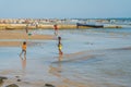 Children at the coastline from Morondava during low tide Royalty Free Stock Photo