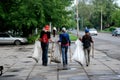 Children collect garbage. Sign of the times.