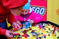 Children collect Lego constructor at a company presentation - Moscow, Russia, 08 02 2019