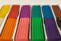 Children color wax plasticine for creativity isolated
