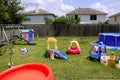 Children colorful playground at home green grass Royalty Free Stock Photo