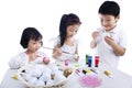 Children Coloring Easter Eggs Royalty Free Stock Photo