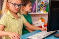 Children computer class us for education and video game. Royalty Free Stock Photo