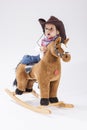 Children Consepts. Little Caucasian Girl Posing in Cowgirl Cloth