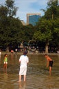 Children cool off on a summer`s day