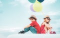 Children on countryside on sky background isolated. Little boy with little girl - kids couple in love. Funny kids Royalty Free Stock Photo