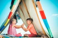 Children couple playing in tent. Camping. Summer outdoor activity. Happy childhood concept. Cute kids. Royalty Free Stock Photo