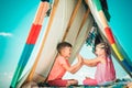 Children couple playing in tent. Camping. Summer outdoor activity. Happy childhood concept. Cute kids. Royalty Free Stock Photo