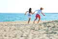 Children couple running on beach. Royalty Free Stock Photo