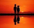 Children couple at sunset