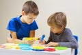 Children creating with 3d printing pen Royalty Free Stock Photo