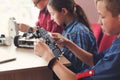 Stem education. Kids creating robots at school Royalty Free Stock Photo