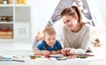 Children creativity. mother and baby son drawing together Royalty Free Stock Photo