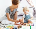 Children creativity. mother and baby son drawing together Royalty Free Stock Photo