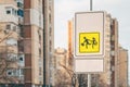 Children crossing in proximity of school traffic sign a warning and advising road users to drive extra slowly Royalty Free Stock Photo