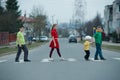 Children crossing street on crosswalk Royalty Free Stock Photo