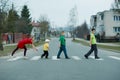 Children crossing street on crosswalk