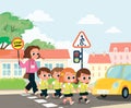 Children crossing the street by crosswalk