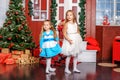Children dance near the Christmas tree. Concept New Year, Merry