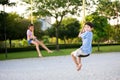Children dangling on the suspension rope in playgr Royalty Free Stock Photo