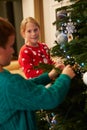 Children Decorating Christmas Tree At Home Royalty Free Stock Photo