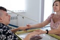 disabled child doing sensory activity with sand, rehabilitation