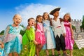 Children diversity in festival costumes standing Royalty Free Stock Photo