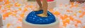 Children do improving massage of feet and develop a motility of fingers BANNER, LONG FORMAT