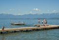 Children on Dock, Montana Lake Royalty Free Stock Photo