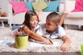 Children doing homework at home