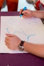 Children draw pictures for parents