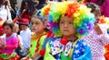 Children dressed as clowns at the parade, Ecuador