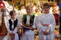 Children dressed in traditional folk costumes in the church at the Mass on Thanksgiving day in Stitar, Croatia