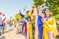 children dressed up as buffoons welcome graduates of schools on the Volga river embankment during the holiday Last call on a spri