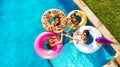 Children drink soda swim in pool on inflatable toy