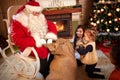 Children eagerly waiting gift from Santa Claus