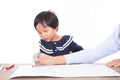 Children earnestly study drawing lessons under the guidance of the teacher