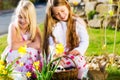 Children on Easter egg hunt with bunny Royalty Free Stock Photo