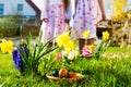 Children on Easter egg hunt with eggs Royalty Free Stock Photo