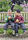 Children eating apples Royalty Free Stock Photo