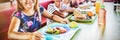 Children eating at the canteen