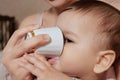 children eating healthy food at home or kindergarten. Happy toddler boy drinking white kefir Royalty Free Stock Photo