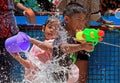 Children enjoy play water battle