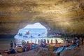 Children, enjoying Benagil, Portugal. Benagil Cave inside Algar de Benagil, famous sea cave in Algarve coast, Lagoa